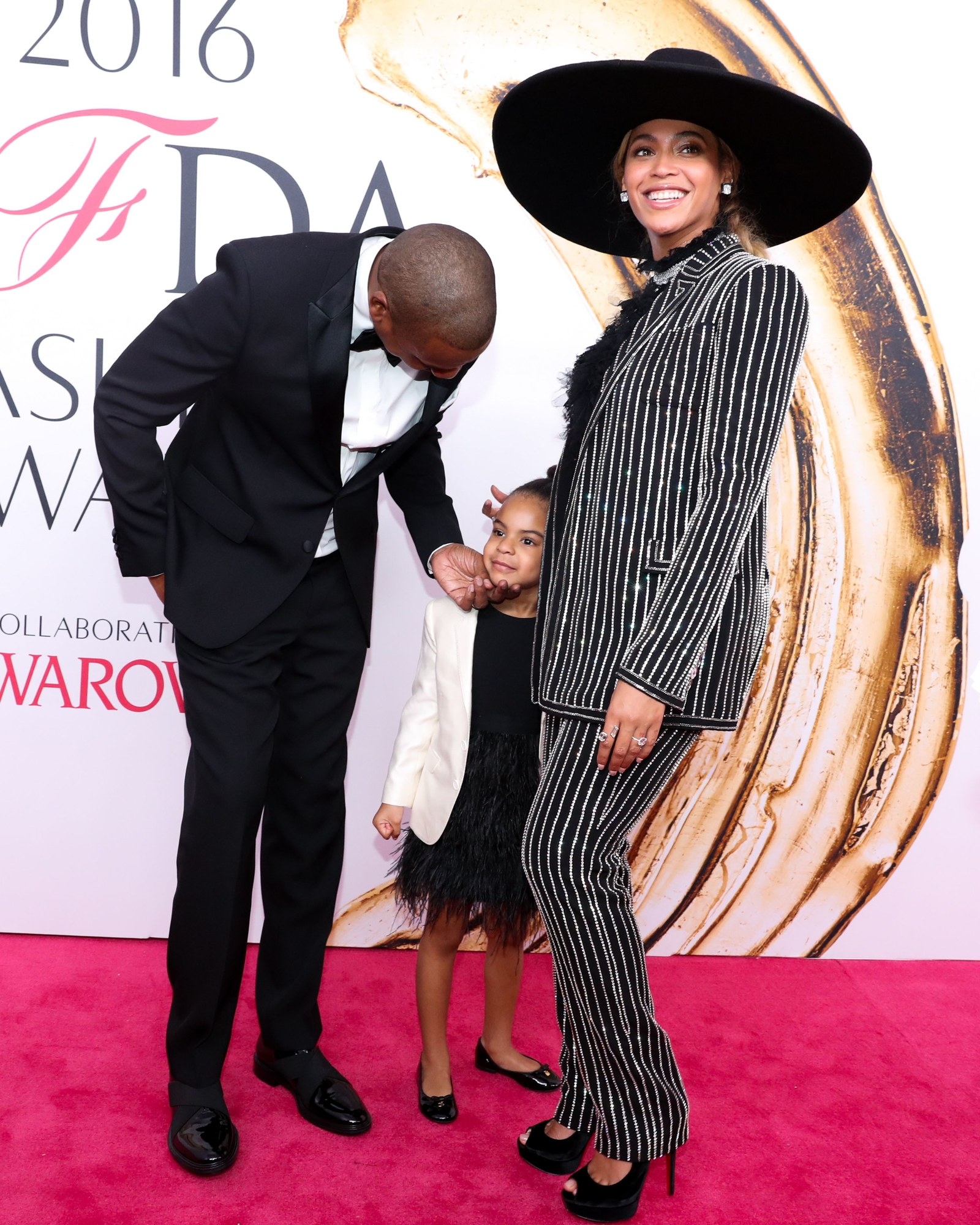 blue ivy dress on red carpet Beyonc and Daughter Blue Ivy Match in Golden Gowns at 'Mufasa' L.A. Premiere